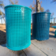 Trash cans along a walkway