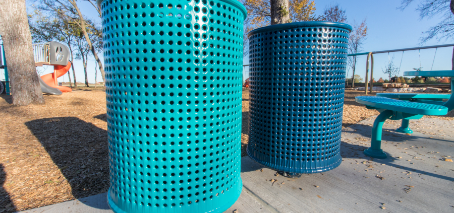 Trash cans along a walkway