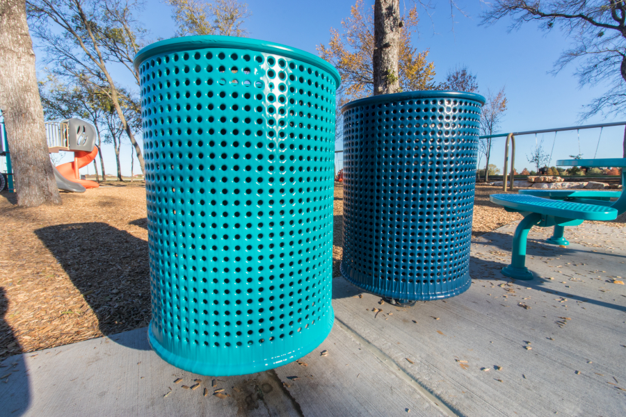 Trash cans along a walkway