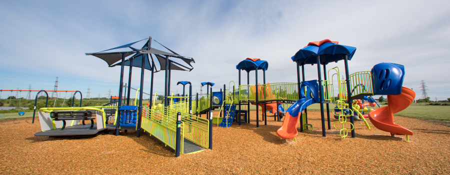 Playground with inclusive wheelchair accessible equipment