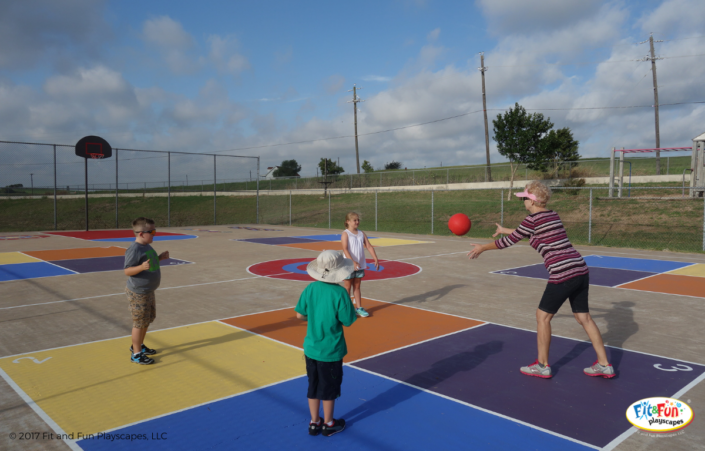 Three kids and an adult playing Fit and Fun foursquare