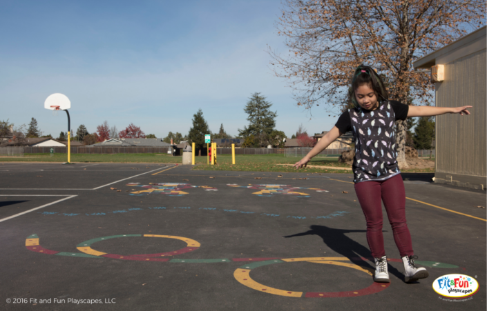 Young girl balancing on Fit and Fun path
